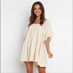 Cream colors dress from petal and pup. Normally $90. Super comfortable!